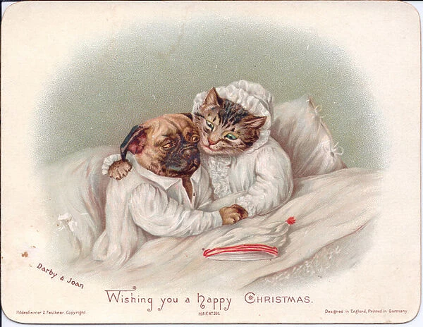 A Victorian Christmas card of a cat and a bulldog in bed having a cuddle, c
