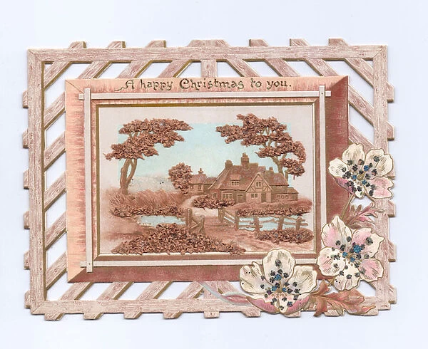A Victorian Christmas card of cottages made out of cork mounted on to a die-cut trellis