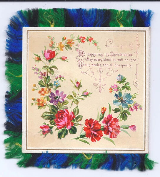 A Victorian Christmas Card of a garland of roses and carnations