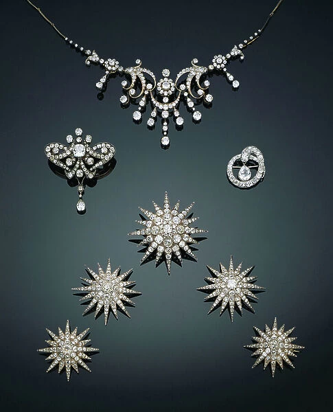 A Victorian diamond necklace / tiara, c.1890; An antique Russian diamond brooch, c.1890; An antique diamond serpent brooch, later rhodium plated, c.1840; five Victorian star brooches, set with cushion-cut diamonds, c.1870