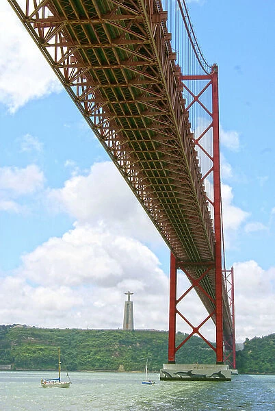 View of The 25 de Abril Bridge and Christ the King statue from the north bank of Tejo river, Lisbon, Portugal (photo)