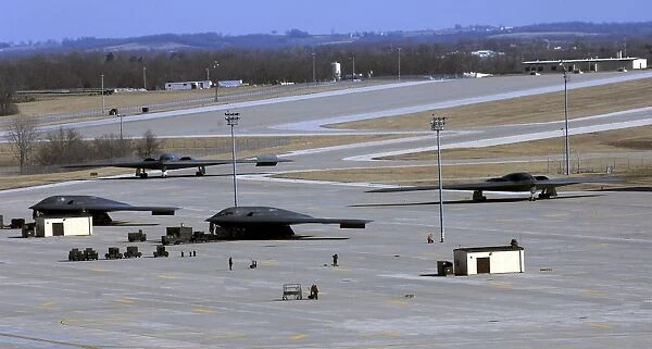 Two B-2 Bombers taxi down Taxiway Delta