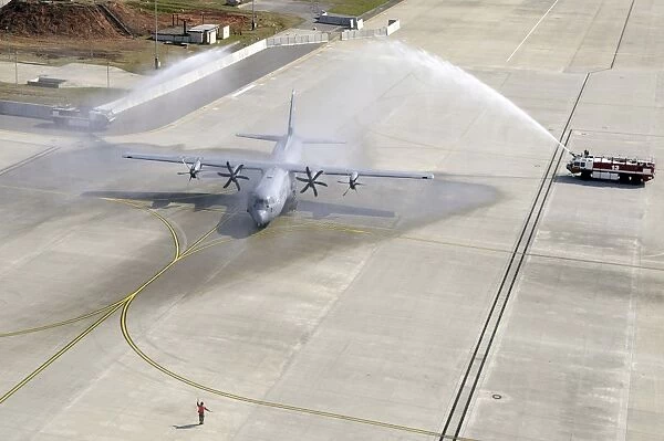 The C-130J lands on Ramstein Air Base for the first time during a ceremony