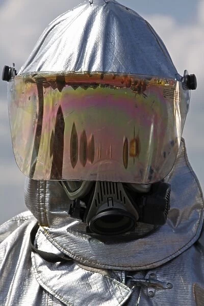 Close-up view of a firefighter in a fire proximity suit