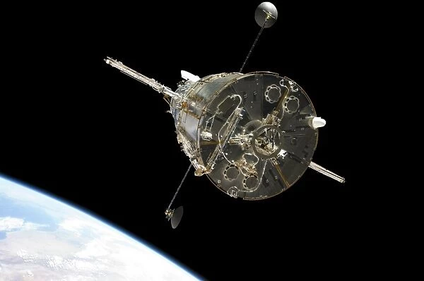 The Hubble Space Telescope in orbit above Earth