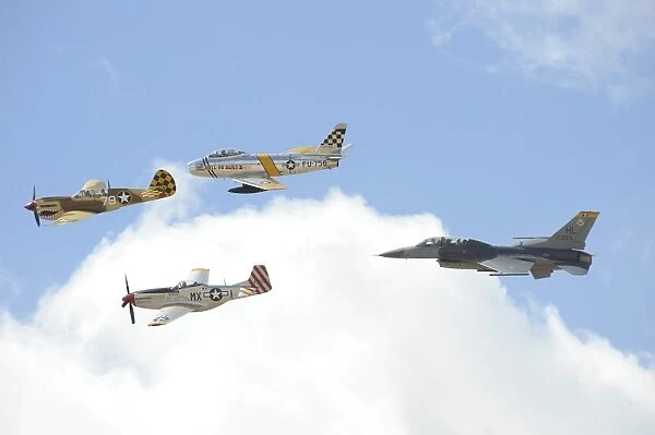 Military planes fly in formation during a Heritage Flight