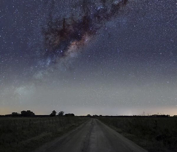 The Milky Way galaxy over a rural road in Mercedes, Argentina