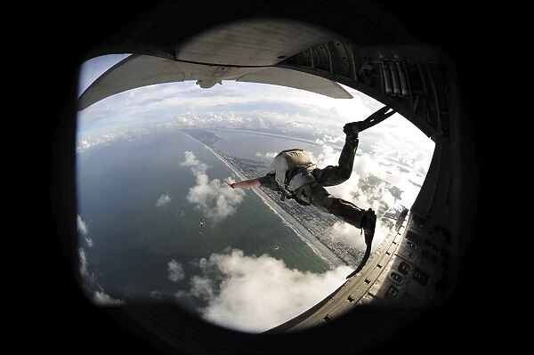 pararescuemen jumps from an HC-130P  /  N King