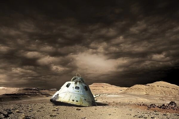 A scorched space capsule lies abandoned on a barren world