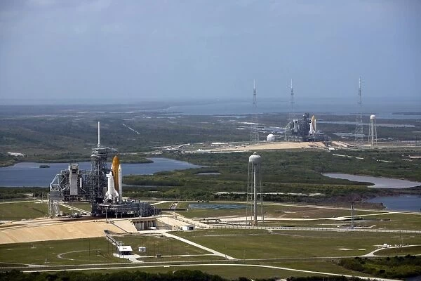 Space Shuttle Atlantis on Launch Pad 39A is accompanied by space shuttle Endeavour
