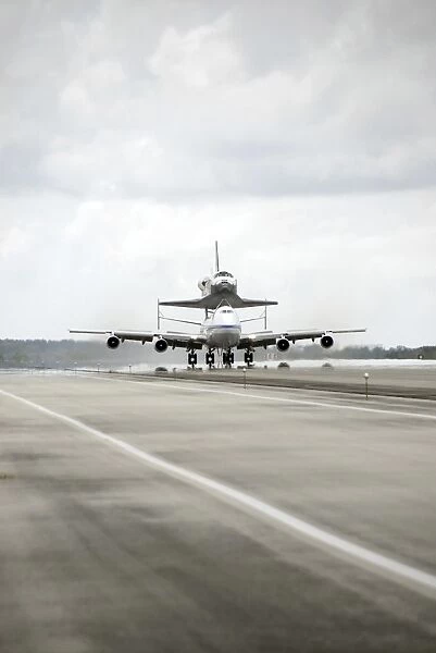 Space shuttle Discovery sits atop the Boeing 747 Shuttle Carrier Aircraft