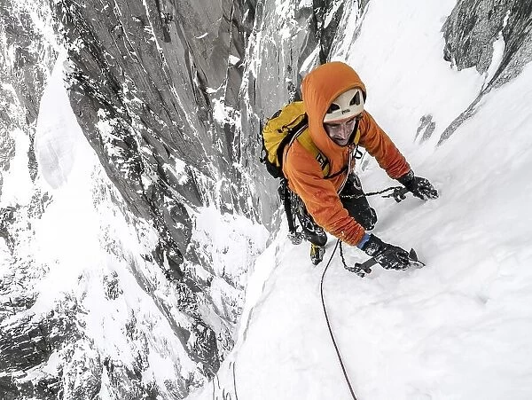 Tom Grant arriving in the upper Couloir Nord des Drus, Chamonix, France