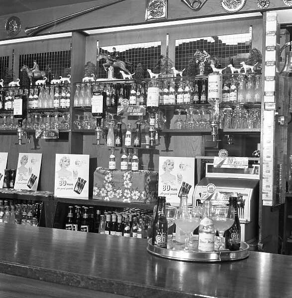 Bar of the Cavalier pub, Ravenfield, near Rotherham, South Yorkshire, 1963. Artist