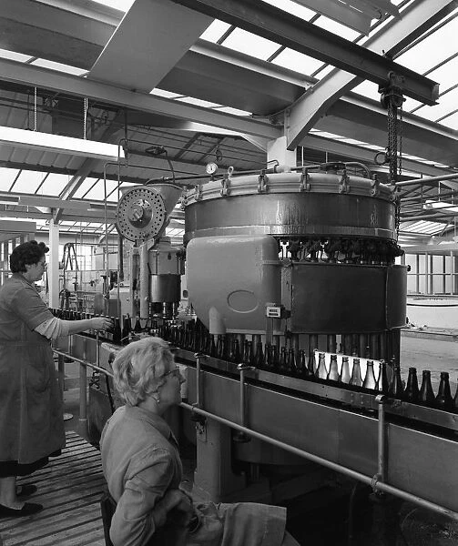 Bottling beer at Ward & Sons bottling plant, Swinton, South Yorkshire, 1961. Artist