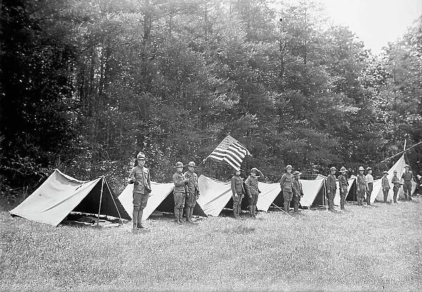 Boy Scouts Standing In Front of Tents In Encampment, between 1914 and 1917. Creator: Harris & Ewing. Boy Scouts Standing In Front of Tents In Encampment, between 1914 and 1917. Creator: Harris & Ewing