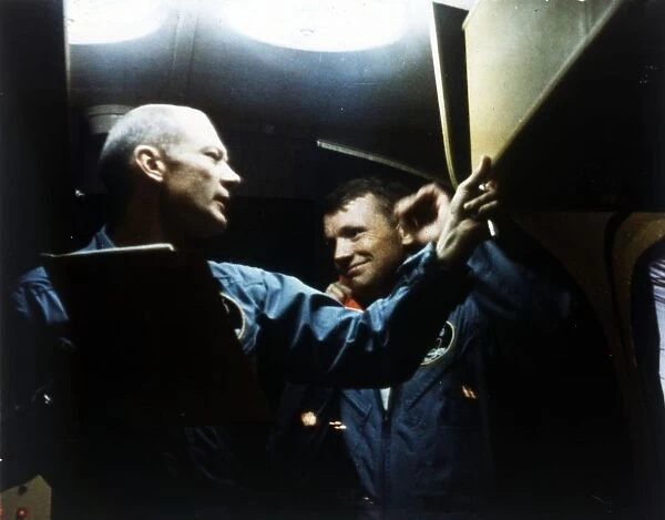 Buzz Aldrin and Neil Armstrong in quarantine, Apollo 11 mission, July 1969. Creator: NASA