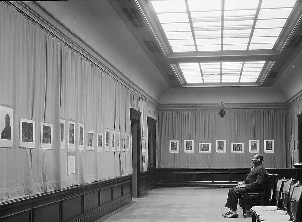 Exhibition of Arnold Genthe's photographs, between 1929 and 1942. Creator: Arnold Genthe