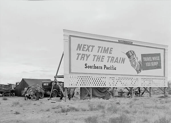 Three families camped on the plains along US 99 in California, 1938. Creator: Dorothea Lange