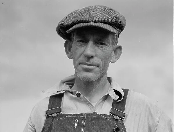 Father of landless sharecropper family, Macon County, Georgia, 1937. Creator: Dorothea Lange