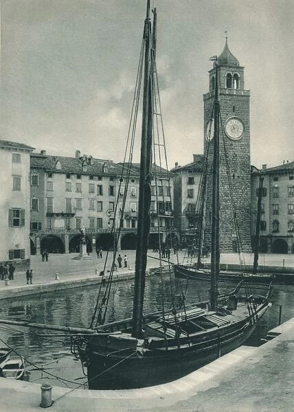 Harbour and Torre Apponale, Riva del Garda, Italy, 1927. Artist: Eugen Poppel