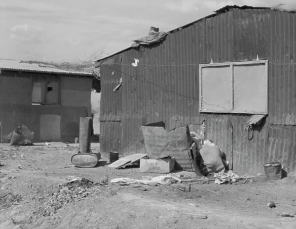 Housing for migratory cotton field laborers near Casa Grande, Arizona, 1937. Creator: Dorothea Lange