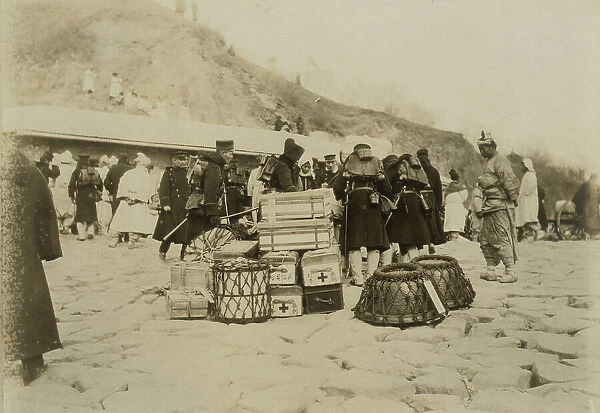 Japanese Hospital Corps landing medical and surgical supplies at Chemulpo, c1904. Creator: Robert Lee Dunn
