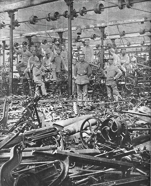 La Suppression de L'Industrie Francaise; la destruction au Marteau des metiers du tissage... 1917. Creator: Unknown