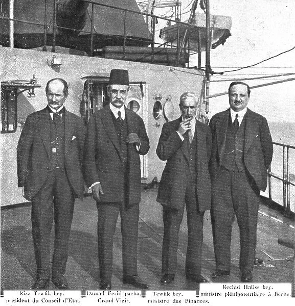 Le retour a la paix; Les delegues ottomans sur la plage arriere du cuirasse francais... 1919. Creator: Unknown