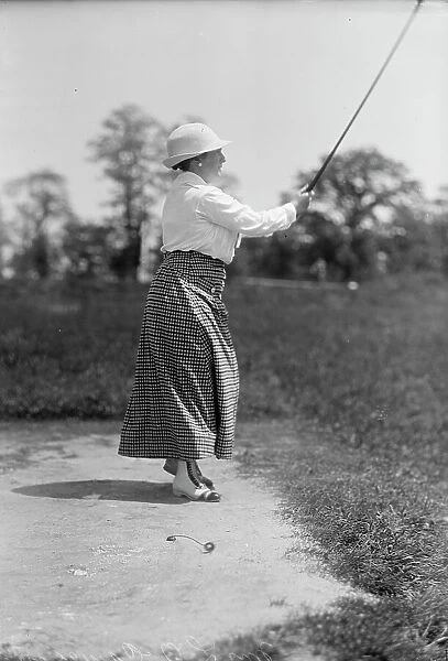 Mrs. L.O. Cameron - Playing Golf, 1913. Creator: Harris & Ewing. Mrs. L.O. Cameron - Playing Golf, 1913. Creator: Harris & Ewing