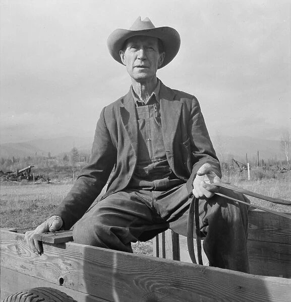 Was Nebraska farmer, now developing land in cut-over area, Bonner County, Idaho, 1939. Creator: Dorothea Lange