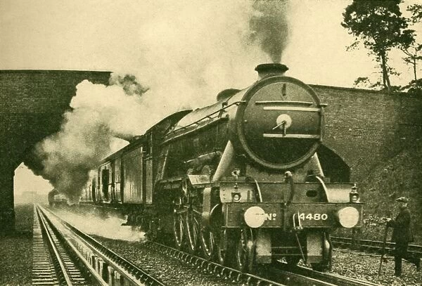 A Pacific Engine Picking Up Water at the Rate of 2, 500 Gallons in Ten Seconds - London