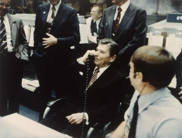 President Ronald Reagan speaks to astronauts on the Space Shuttle, 1981. Creator: NASA