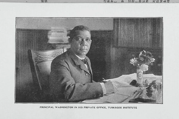 Principal Washington in his private office, Tuskegee Institute, 1923. Creator: Unknown