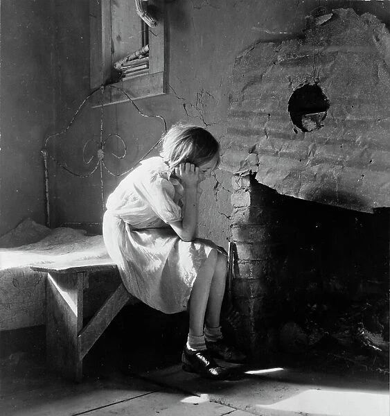Resettled farm child from Taos Junction to Bosque Farms project, New Mexico, 1935. Creator: Dorothea Lange