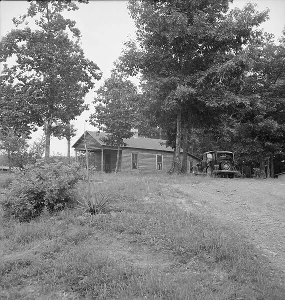 A 'shotgun'weatherboard house built in 1925, Person County, North Carolina, 1939. Creator: Dorothea Lange