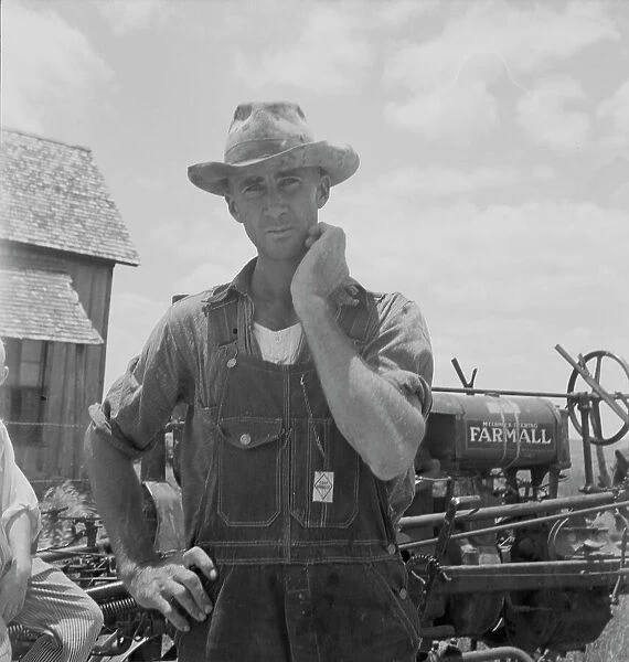 Former tenant farmer on a large cotton farm, now a tractor driver, Bell County, Texas, 1937. Creator: Dorothea Lange