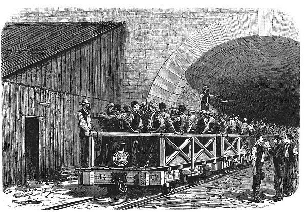 Tunnel opening of the Alps, workers exiting after a working day by the French mouth
