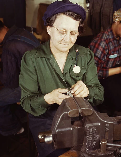 War production worker at the Vilter [Manufacturing] Company making M5... Milwaukee, Wis. 1943. Creator: Howard Hollem