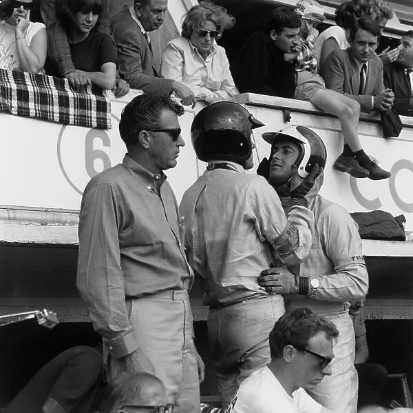 1964 Le Mans 24 hours. Le Mans, France. 20th - 21st June 1964. Carroll Shelby with Bob Bondurant and Dan Gurney (AC Cobra Daytona), 4th position, in the pits before the start of the race, portrait. World Copyright: LAT Photographic. Ref: 25155