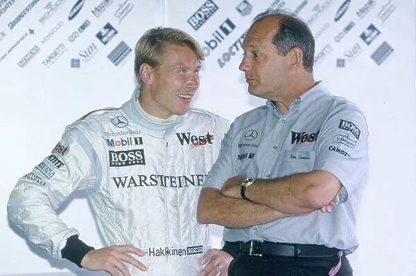 2000 Belgium Grand Prix. Spa Francorchamps, Belgium. 25th - 27th August 2000. Race winner Mika Hakkinen, with TAG McLaren Team Director Ron Dennis - portrait. World - LAT Photographic ref: 35 mm colour transparency