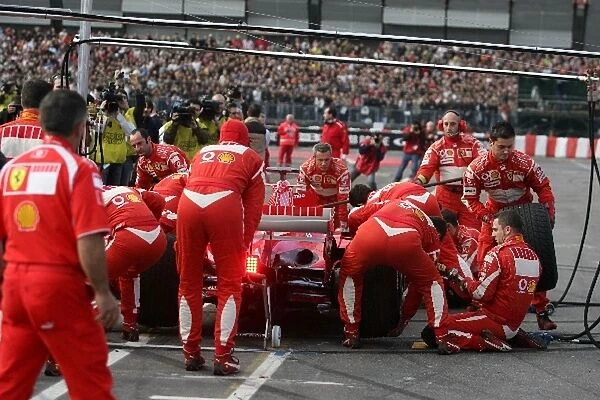 Bologna Motor Show: Marc Gene and the Ferrari team demonstrate a pit stop