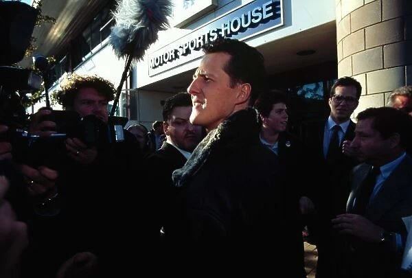 FIA HEARING, ENGLAND 11 / 11 / 97. MIchael Schumacher leaves the RACMSA Headquarters after being thrown out of the 1997 World Championship, losing all his points, but officially keeping his race wins. Photo: LAT / Tee