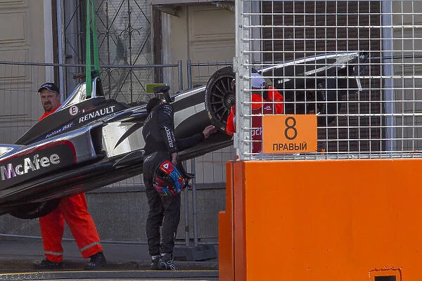 Formula E. Loic Duval (FRA) - Dragon Racing watches his car being recovered