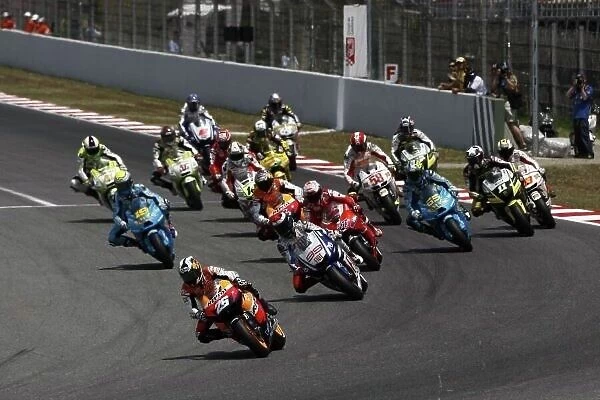 MotoGP. Dani Pedrosa (ESP), Repsol Honda Team, leads at the start of the race.