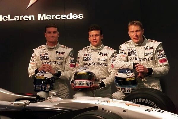 WEST McLaren Mercedes MP4 / 15 Launch Jerez, Spain, 3rd February 2000. David Coulthard, Olivier Panis and Mika Hakkinen. World Jennings / LAT Photographic email digital@latphoto. co. uk