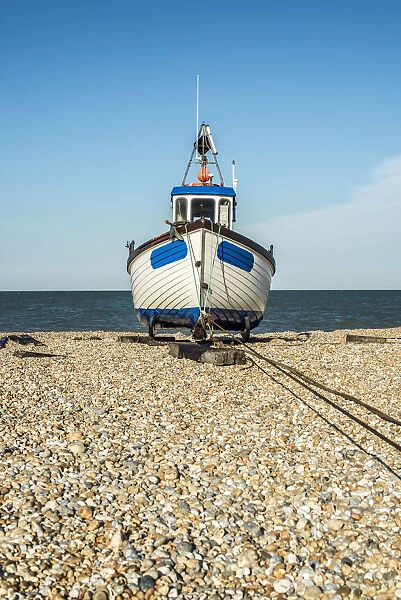 A Boat On A Shingle Beach; Dungeness, Kent, England