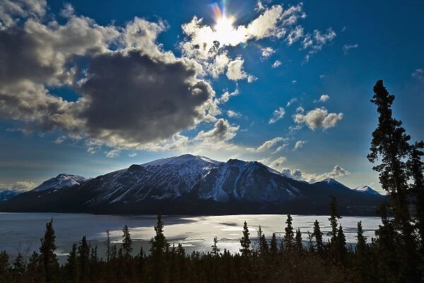 Frozen tagish lake and mountains; Carcross yukon canada