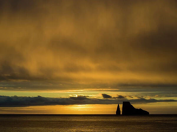 Leon Dormido or Kicker Rock at sunset from San Cristobal Island
