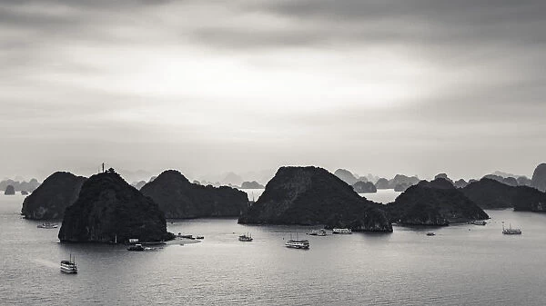 Limestone karsts and boats in Ha Long Bay, Vietnam
