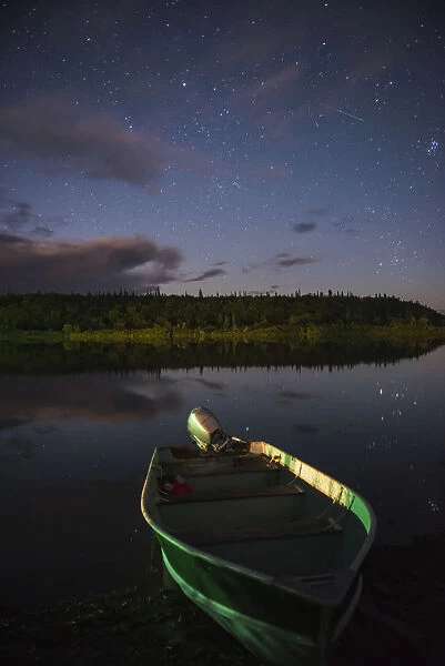 A Skiff Rests On The Banks Of The Kvichak River At Night, Bristol Bay Region, Southwest Alaska